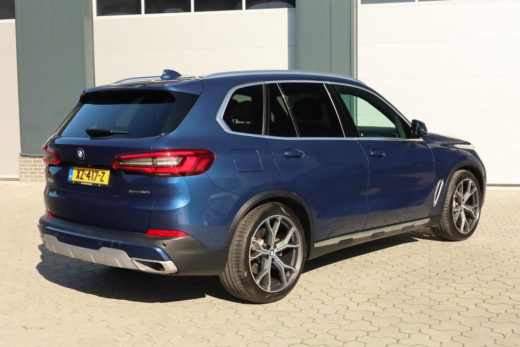 BMW X5 XDrive40i High Executive Luchtvering 4-wielsturing Pano Trekhaak Carplay Harman Kardon 56215369-1.jpg | De Occasion Fabriek