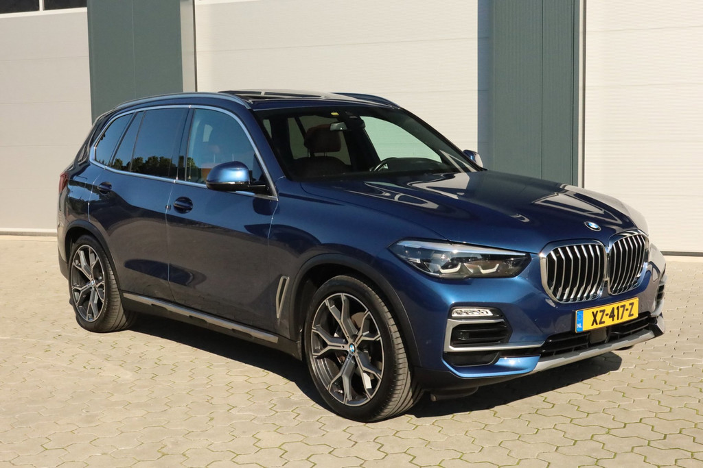 BMW X5 XDrive40i High Executive Luchtvering 4-wielsturing Pano Trekhaak Carplay Harman Kardon 56215369-4.jpg | De Occasion Fabriek